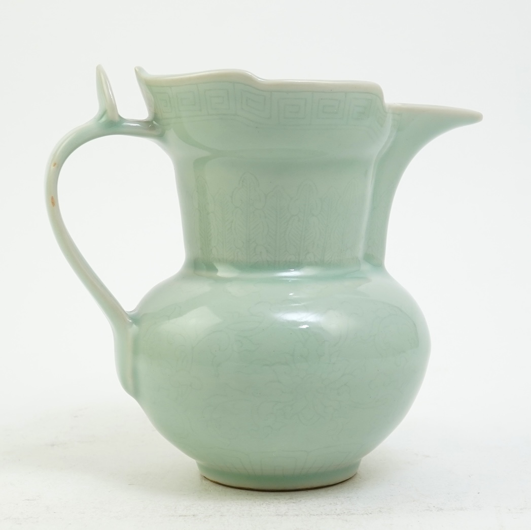 A Chinese incised celadon glazed monks cap ewer, Qianlong seal mark but later, 17cm